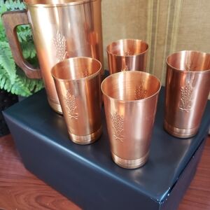 Copper pitcher and cups